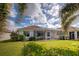 Home with a fenced backyard and screened patio at 19279 Jacinda St, Venice, FL 34293
