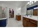 Spa-like bathroom with double vanity and walk-in shower at 19279 Jacinda St, Venice, FL 34293