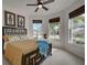 Bright bedroom with large windows, ceiling fan, and a comfortable bed at 19279 Jacinda St, Venice, FL 34293
