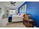 Comfortable guest bedroom with two twin beds and window at 19279 Jacinda St, Venice, FL 34293