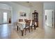 Charming dining room with four chairs and a wooden table at 19279 Jacinda St, Venice, FL 34293
