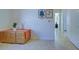 Small home office with file cabinet and view down hallway at 19279 Jacinda St, Venice, FL 34293