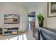 Bright home office features built-in desk and view into living area at 19279 Jacinda St, Venice, FL 34293
