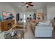 Spacious living room with ample seating and access to dining area at 19279 Jacinda St, Venice, FL 34293