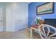 Home office with a desk and built-in shelving at 19279 Jacinda St, Venice, FL 34293