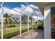 Spacious screened patio overlooking the lake at 19279 Jacinda St, Venice, FL 34293