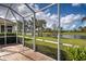 Enjoy water views from this screened patio at 19279 Jacinda St, Venice, FL 34293