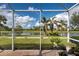 Relaxing screened patio with scenic water views at 19279 Jacinda St, Venice, FL 34293