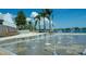 Interactive water feature with spray jets for children at 19279 Jacinda St, Venice, FL 34293