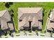 Birds-eye view of townhomes with tile roofs and paved driveways at 20100 Ragazza Cir # 101, Venice, FL 34293