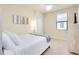 Bedroom with a window, ceiling fan, and carpeted flooring at 20100 Ragazza Cir # 101, Venice, FL 34293