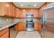 Stylish kitchen with modern appliances and plenty of cabinet space at 20100 Ragazza Cir # 101, Venice, FL 34293
