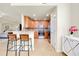 Well-equipped kitchen with breakfast bar and ample counter space at 20100 Ragazza Cir # 101, Venice, FL 34293