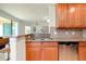 Kitchen boasts granite countertops, stainless steel appliances, and ample storage at 20100 Ragazza Cir # 101, Venice, FL 34293