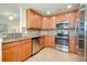 Updated kitchen with stainless steel appliances and granite countertops at 20100 Ragazza Cir # 101, Venice, FL 34293