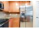 Modern kitchen with stainless steel appliances and granite counters at 20100 Ragazza Cir # 101, Venice, FL 34293