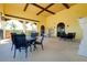 Outdoor patio area with tables, chairs, and a ping pong table at 20100 Ragazza Cir # 101, Venice, FL 34293
