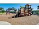 Community playground with various play structures at 20100 Ragazza Cir # 101, Venice, FL 34293