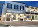 Villani & Co. restaurant storefront illuminated at night at 20100 Ragazza Cir # 101, Venice, FL 34293