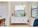 Bright sitting area with large windows, stylish decor, and natural light at 20100 Ragazza Cir # 101, Venice, FL 34293