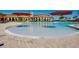 Wading pool adjacent to the main community pool and clubhouse at 20100 Ragazza Cir # 101, Venice, FL 34293