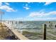 View of the waterfront with dock pilings at 227 Bahia Vista Dr, Englewood, FL 34223