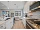 Bright kitchen with a breakfast nook, stainless steel appliances, and lots of counter space at 26069 Norman Dr, Englewood, FL 34223