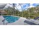 Relaxing pool and patio with screened enclosure at 275 Royal Oak Way, Venice, FL 34292