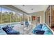 Relaxing poolside patio with covered lanai and seating at 275 Royal Oak Way, Venice, FL 34292