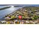 Aerial view of a house near the water, highlighting its waterfront location and neighborhood at 3436 Santa Clara Dr, Punta Gorda, FL 33983