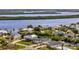 Aerial view of waterfront homes with lush landscaping and private boat docks at 3436 Santa Clara Dr, Punta Gorda, FL 33983