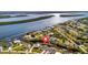Aerial view showing home's location on waterfront property with canal access at 3436 Santa Clara Dr, Punta Gorda, FL 33983
