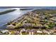 Aerial view showcasing waterfront homes and a peaceful community at 3436 Santa Clara Dr, Punta Gorda, FL 33983
