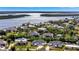 Aerial view of a waterfront neighborhood with lush landscaping and water access at 3436 Santa Clara Dr, Punta Gorda, FL 33983