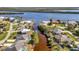 Aerial view of waterfront community with private docks at 3436 Santa Clara Dr, Punta Gorda, FL 33983
