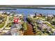 Aerial view of waterfront home with private pool and canal access at 3436 Santa Clara Dr, Punta Gorda, FL 33983