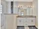 Modern bathroom with granite countertop, double vanity and walk-in shower at 3436 Santa Clara Dr, Punta Gorda, FL 33983