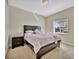 Spacious bedroom with a double bed and nightstand, offering ample floor space at 3436 Santa Clara Dr, Punta Gorda, FL 33983