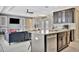 Open kitchen with island, stainless steel appliances and view of living room at 3436 Santa Clara Dr, Punta Gorda, FL 33983