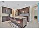 Modern kitchen with dark cabinets and granite countertops at 3436 Santa Clara Dr, Punta Gorda, FL 33983