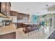 Spacious kitchen featuring granite island and stainless steel appliances at 3436 Santa Clara Dr, Punta Gorda, FL 33983