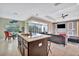 Open kitchen with island, stainless steel appliances, and granite countertops at 3436 Santa Clara Dr, Punta Gorda, FL 33983