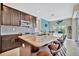 Modern kitchen with granite countertops and breakfast bar at 3436 Santa Clara Dr, Punta Gorda, FL 33983