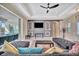 Living room boasts sectional sofa and stylish decor at 3436 Santa Clara Dr, Punta Gorda, FL 33983