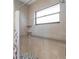 Bathroom with walk-in shower and grab bars at 3667 Yellow Pine Ct # 149, Sarasota, FL 34238
