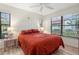 Cozy bedroom with queen bed and ample natural light at 3667 Yellow Pine Ct # 149, Sarasota, FL 34238