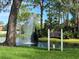 Community fountain with a serene setting and lush landscaping at 3667 Yellow Pine Ct # 149, Sarasota, FL 34238