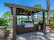Community grilling station with covered pavilion and lake view at 3667 Yellow Pine Ct # 149, Sarasota, FL 34238