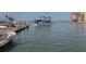 Boat passing by the marina on a sunny day at 3667 Yellow Pine Ct # 149, Sarasota, FL 34238