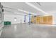 Spacious garage with epoxy flooring, two garage doors, and a car lift at 4130 Rock Creek Dr, Port Charlotte, FL 33948